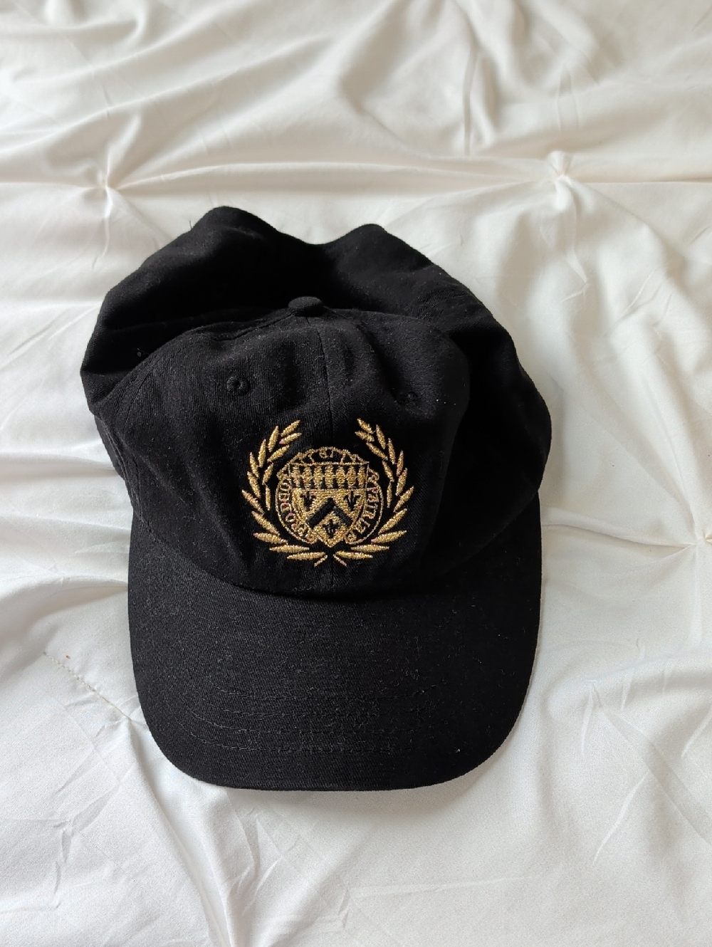 Black Baseball Cap with Gold Embroidered Crest